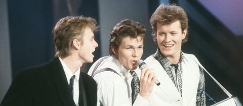  Pål Waaktaar-Savoy, Morten Harket und Magne Furuholmen von a-ha bei einem Konzert 1988