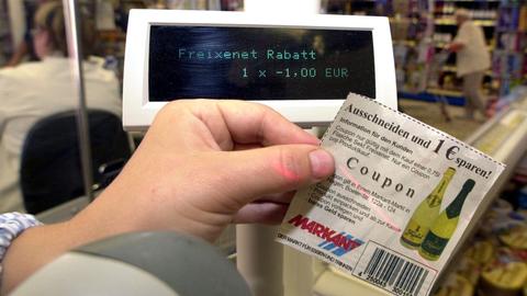 Coupon an der Supermarktkasse